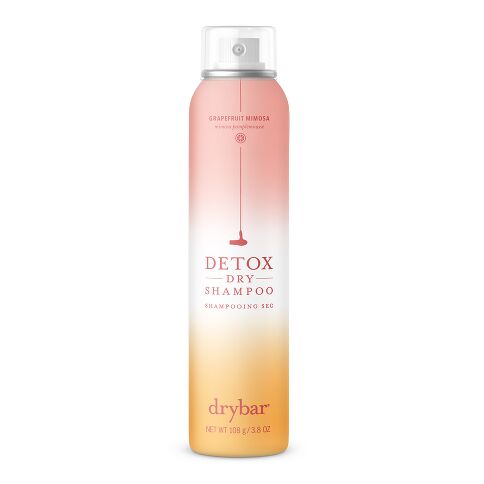 Drybar Detox Dry Shampoo in Grapefruit Mimosa, 3.8 oz pink-to-yellow aerosol can with clear cap