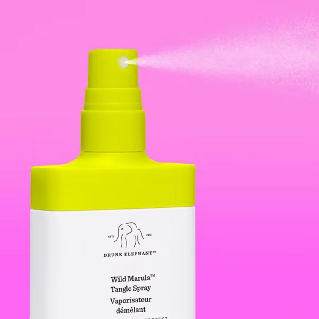 Drunk Elephant Wild Marula Tangle Spray dispensing fine mist