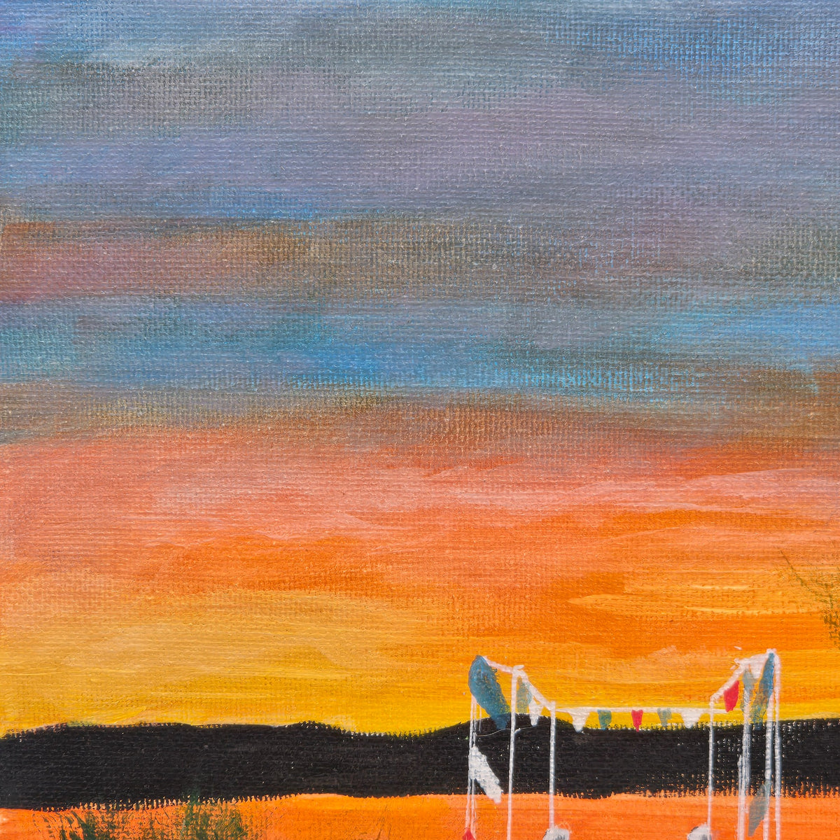 Detail of the layered blue-gray and orange sunset above the pier in Mars Resort Pier