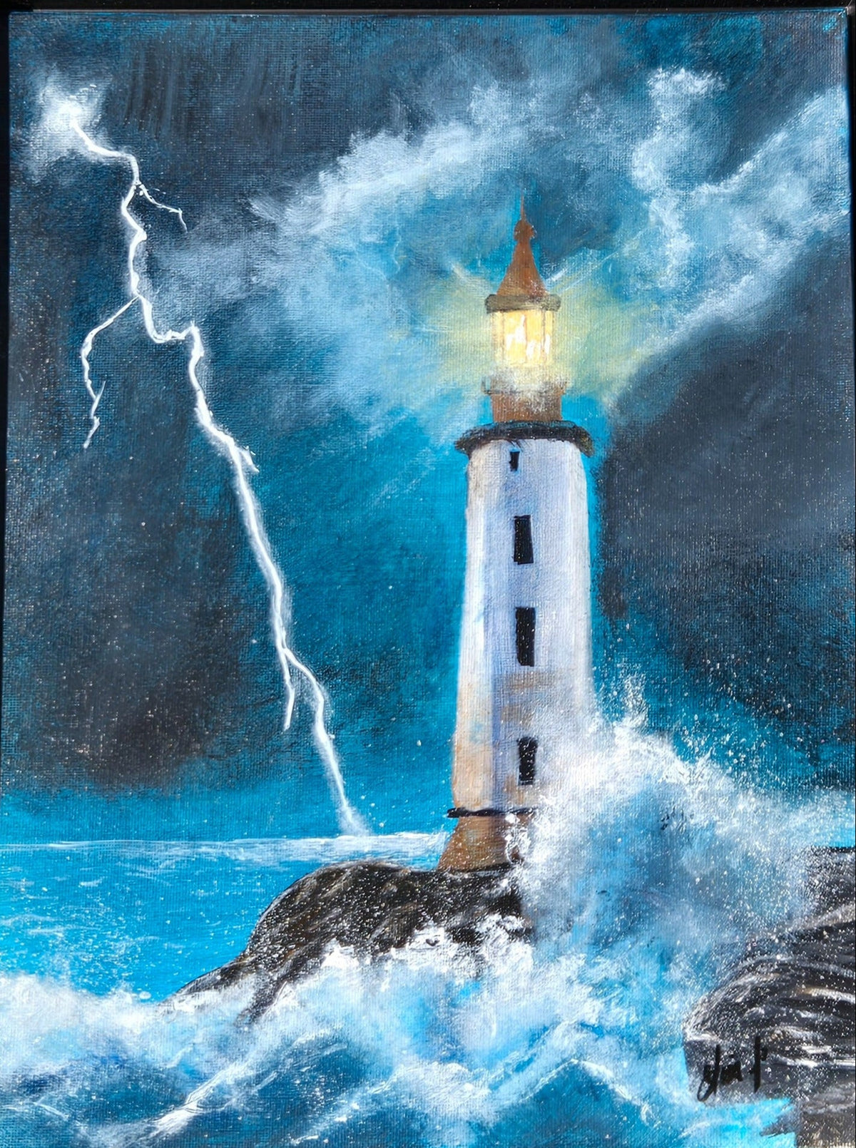 Black-framed original acrylic painting Night Light showing a glowing lighthouse, lightning, and storm-driven waves