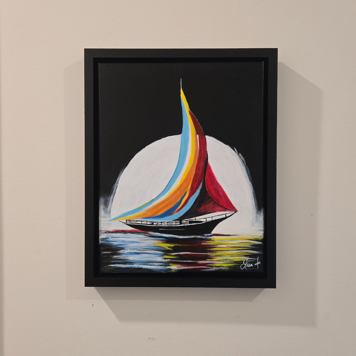 Painted Sails original acrylic painting displayed in its black frame on a wall