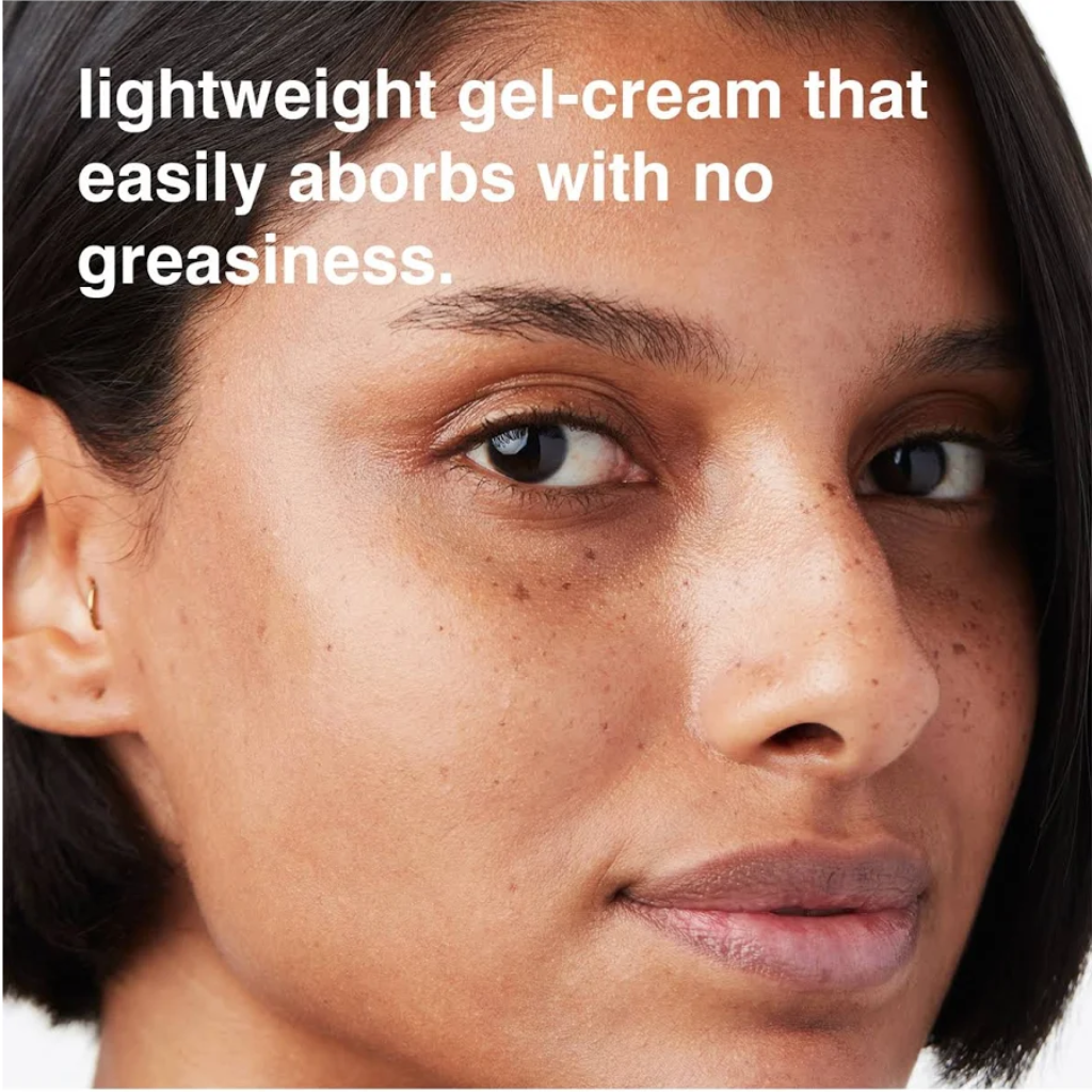 Model showing the lightweight, non-greasy finish of MALIN+GOETZ SPF 30 Mineral Sunscreen