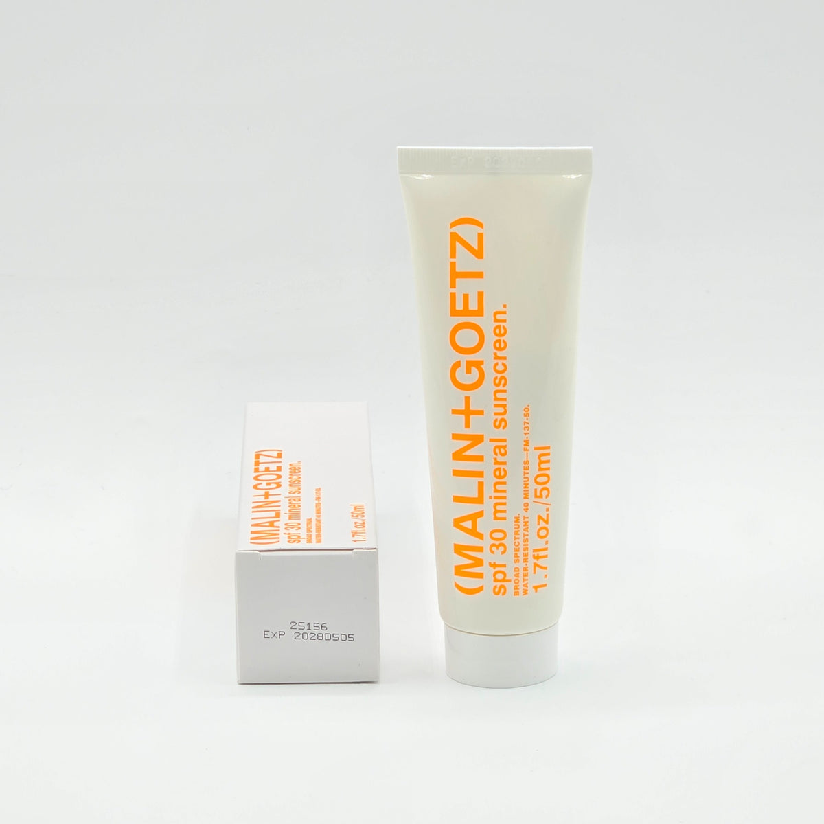 Physical MALIN+GOETZ SPF 30 Mineral Sunscreen showing batch 25156 and expiration May 5, 2028