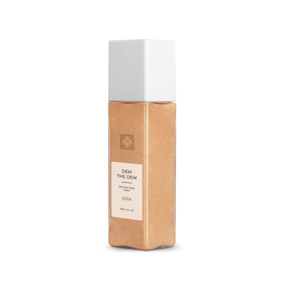 OFRA Dew the Dew Rose Quartz shimmer body lotion capped bottle on white