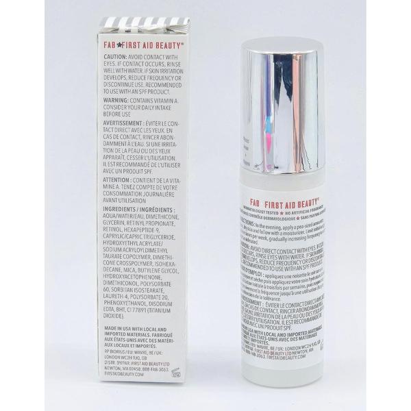 White First Aid Beauty 0.3% Retinol Complex Serum bottle with silver cap next to its white product box.
