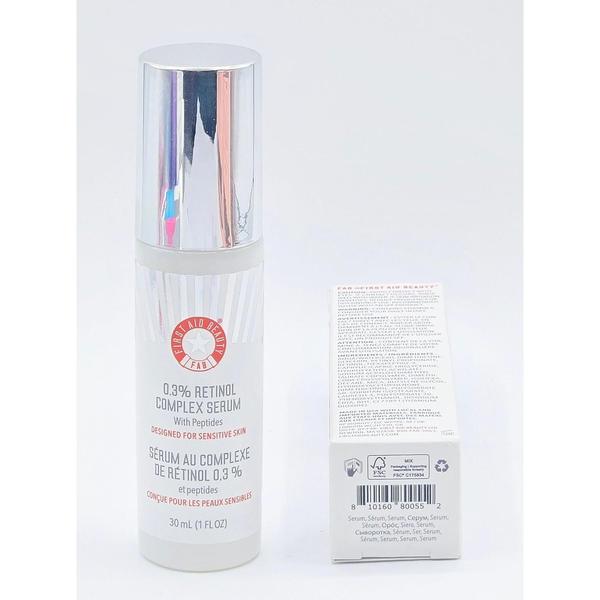 First Aid Beauty 0.3% Retinol Complex Serum 30ml pump bottle with silver cap and white box.