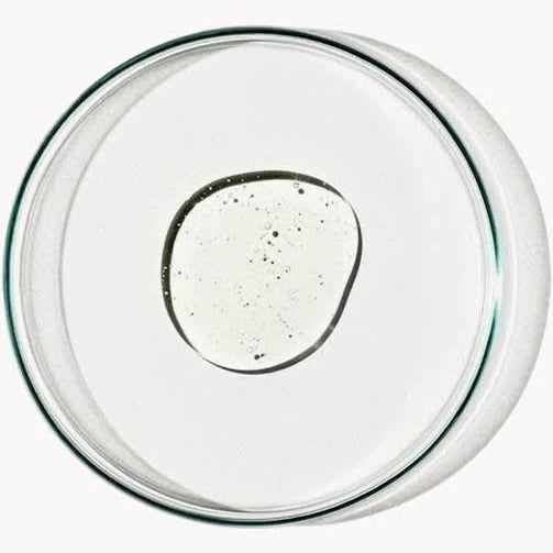 Clear gel texture for Grown Alchemist Soothing Body Gel-Lotion in a round glass dish