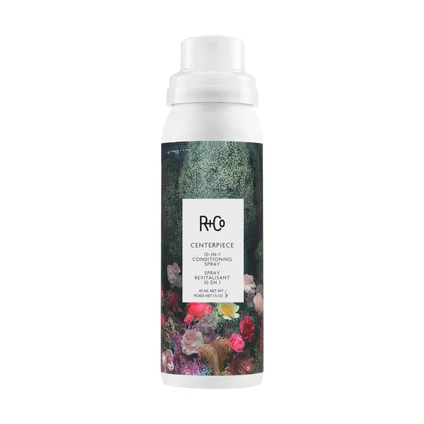 R+Co CENTERPIECE 10-IN-1 Conditioning Spray mini, 1.5 oz, with floral label on a white background.
